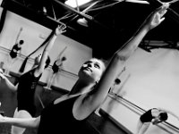 Ari Sweet, 16, progresses through the Cambre Side arc as she and fellow E students work on their barre exercises at the New Bedford Ballet studio on Purchast Street in the north end of New Bedford.   [ PETER PEREIRA/THE STANDARD-TIMES/SCMG ]